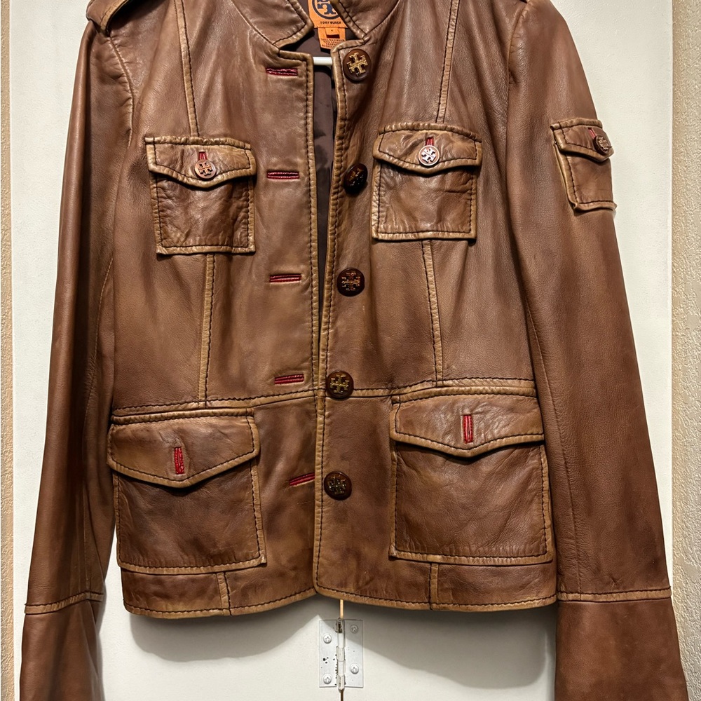 Tory Burch Brown Leather Jacket. Missing a button on the right shoulder size 6